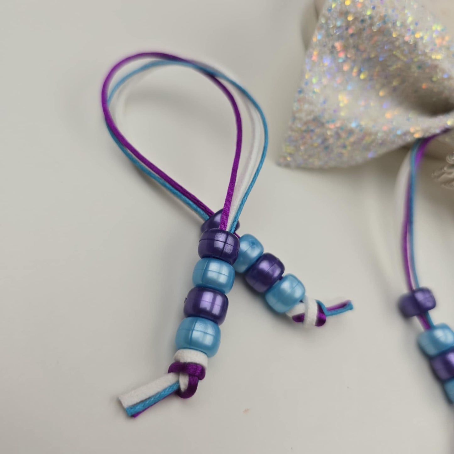 Blue and Purple Bow Beads