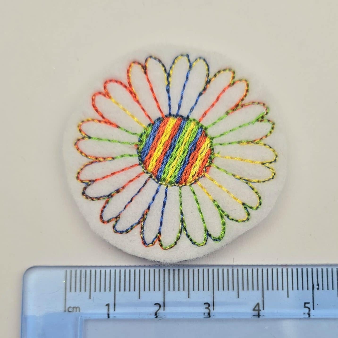 Rainbow flower feltie